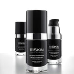 3 bottles of 111SKIN Eye Cream, one with the cap removed.